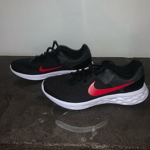Size 9/5 Nike shoes. Red and Black.